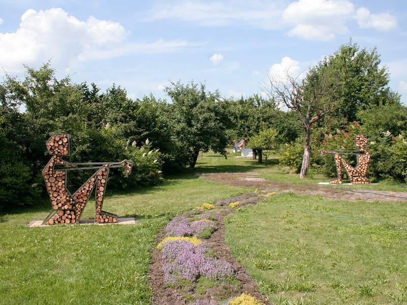 Sitting Figure Iron Wood sculpture by Jakub Flejšar — view 1